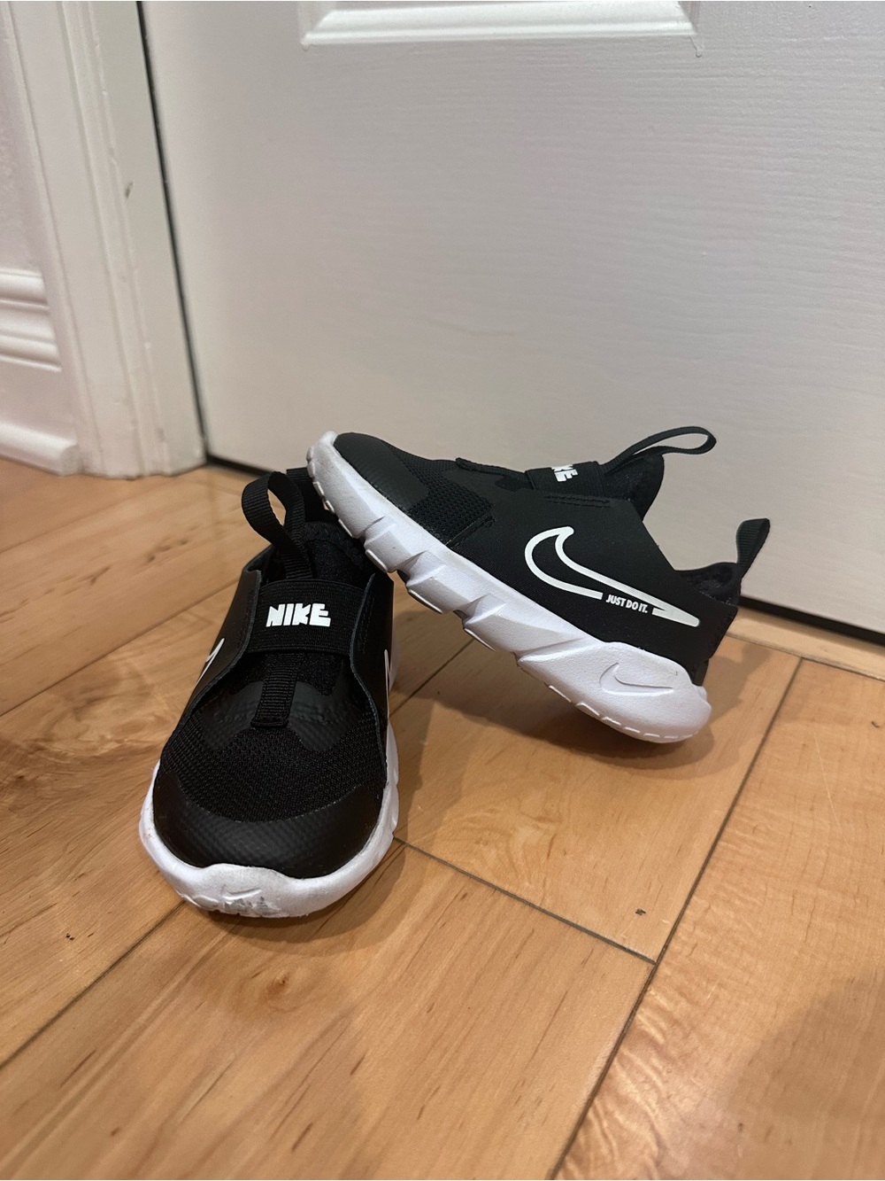 Nike Kids Black & White Slip-On Athletic Shoes